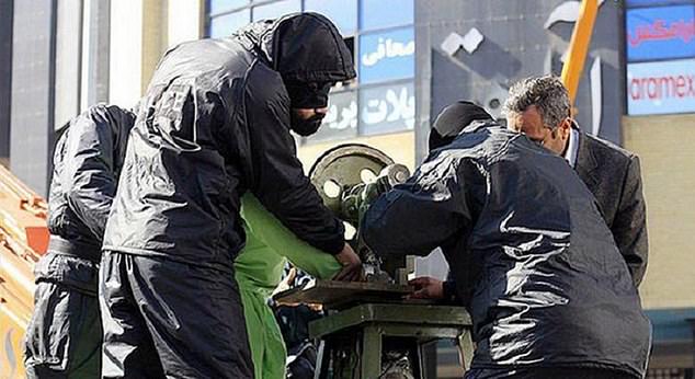 Archive image shows a blindfolded prisoner having his fingers amputated by a guillotine machine. Finger amputation is allowed under the Islamic Republic's penal code but is widely condemned by human rights activists