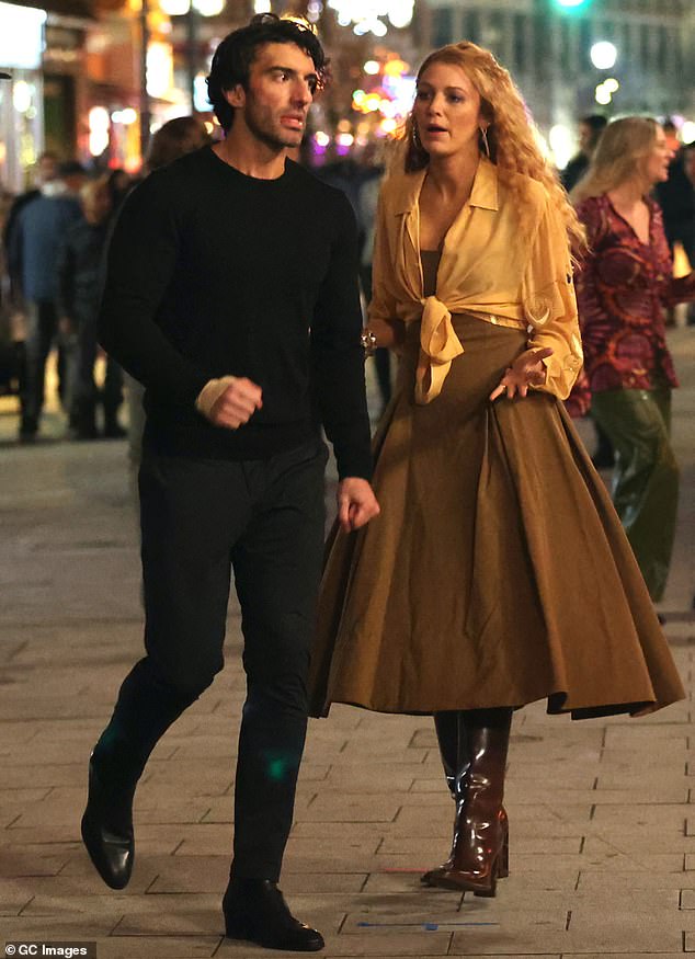 Lively and Baldoni are pictured on the set of their movie It Ends With Us, the source of the bitter legal feud continuing to rage between them