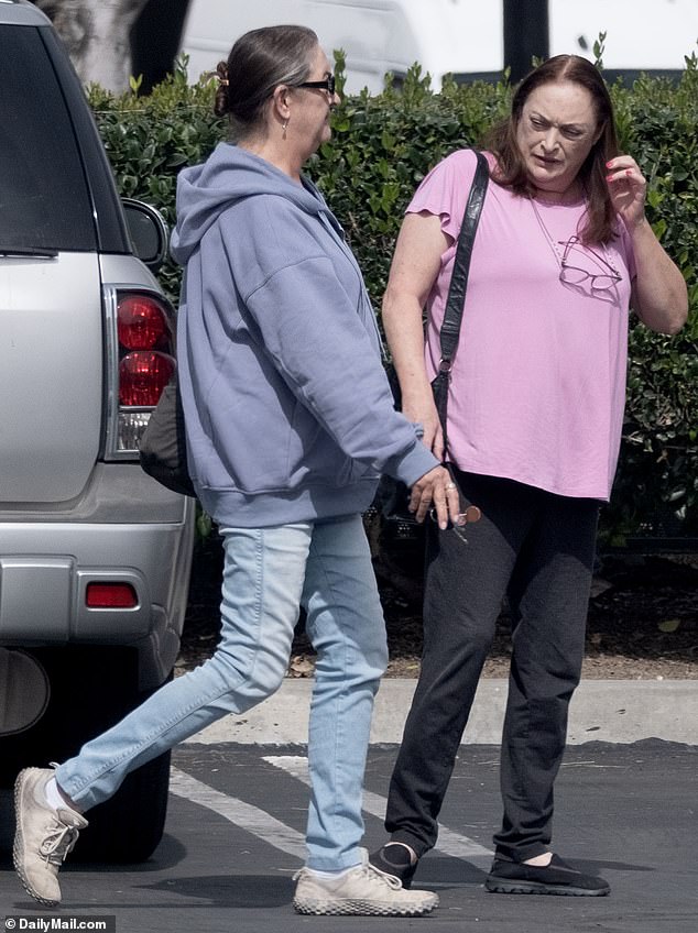 Among those attending were 62-year-old daughter Elizabeth (L) and 58-year-old Leslie (R), as well as his son Christopher, 65; Hackman's daughters are pictured on February 27 near Burbank, Calif.