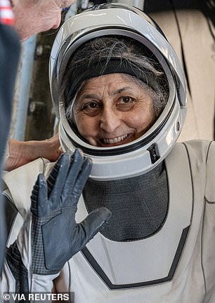 BEFORE: Suni Williams being carried to a stretcher after landing on March 19