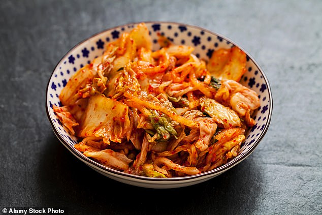 Kimchi is a type of picked cabbage, but look for versions in the chilled section of the supermarket which have 'live' on the label