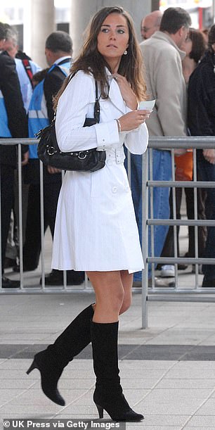 The Berkshire beauty wore a white dress and black knee-high boots to the concert