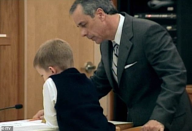 When asked to explain the drawing, he pointed to a stick figure of his mom 'killing my sister'