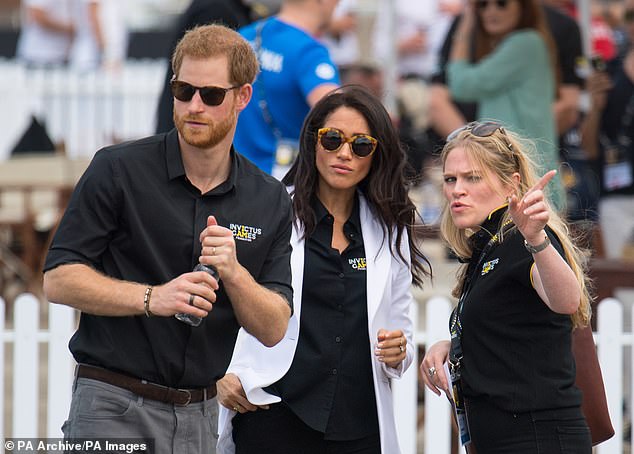 The Duke and Duchess of Sussex with the Duchess's Private Assistant Secretary Amy Pickerill