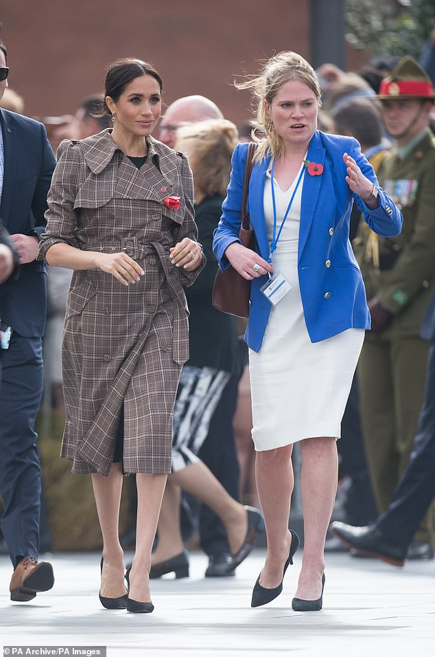 The Duchess of Sussex with her Private Assistant Secretary Amy Pickerill (right) in Wellington on day one of the royal couple's tour of New Zealand in 2018