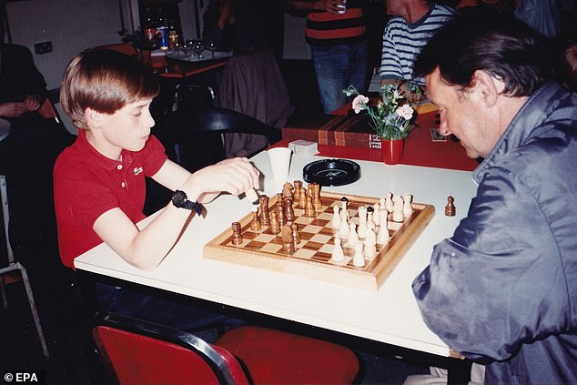 William enjoys a game of chess during his first visit to The Passage in 1993