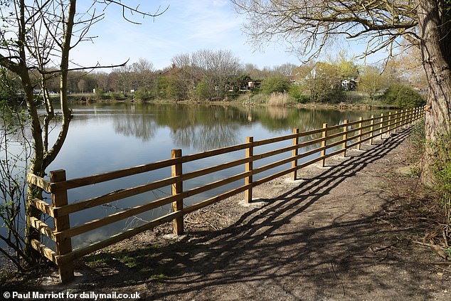 The 'boardwalk' that people used during the summer to sunbathe and swim from, with the Dragonfly Hotel behind trees