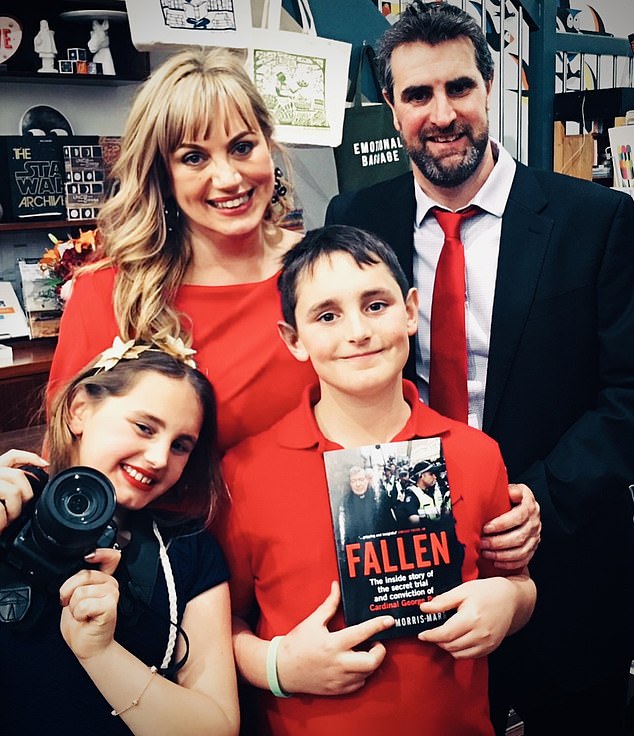 Luice with her husband and children, who were nine and 11 when she had to break the news