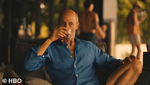 Gary/Greg enjoys a drink