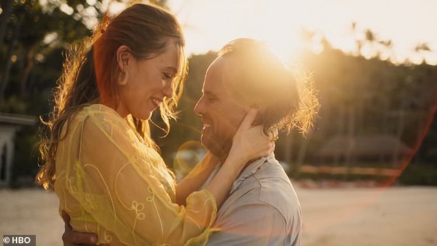 Rick arrives on the beach and Chelsea runs to him and jumps into his arms as Rick smiles and kisses her