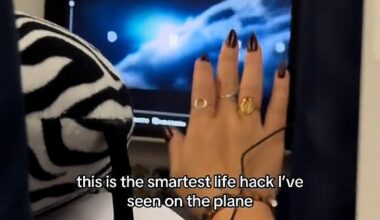 Annie Lengo discovered a fellow plane passenger had used a sick bag to 'hang' her iPad to the tray table latch, keeping it in a stable position for hands-free viewing