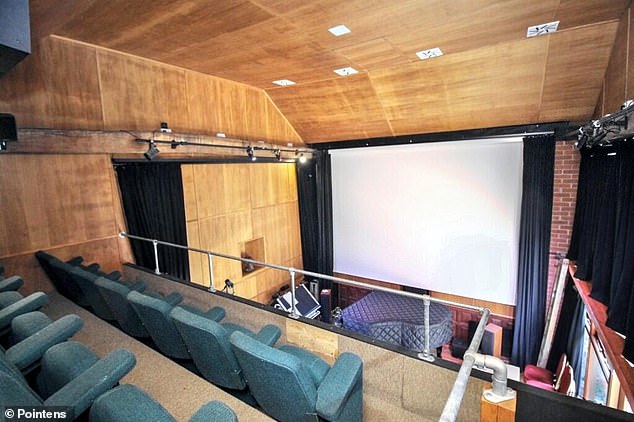People were baffled after noticing a large room, that appeared to be a cinema and performance venue