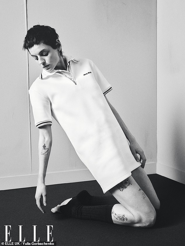 Emma showcased their unique androgynous style as well as a glimpse of their tattoos