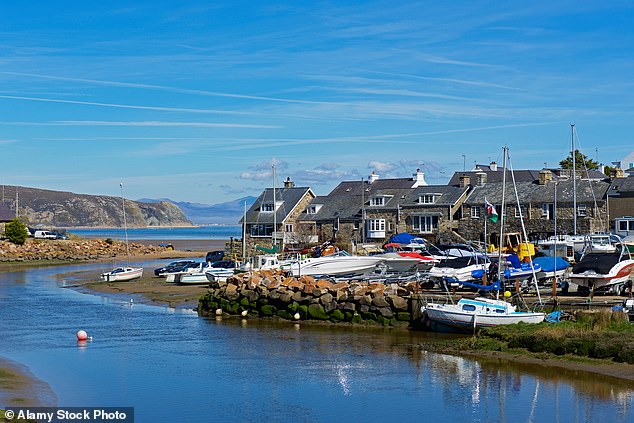 Boats next to the River Soch at low tide in Abersoch, North Wales