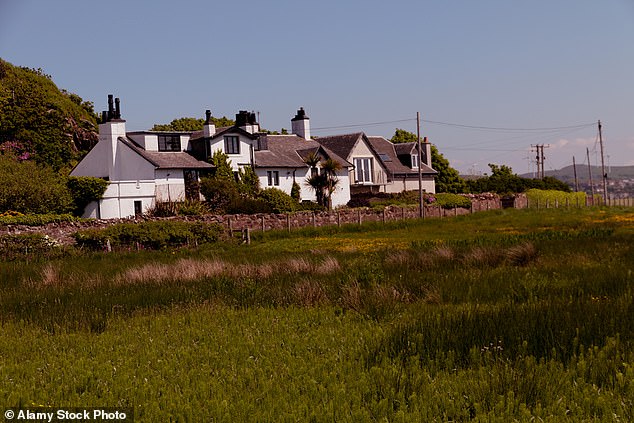 Houses in West Kilbride, North Ayrshire, with a view of rolling hills