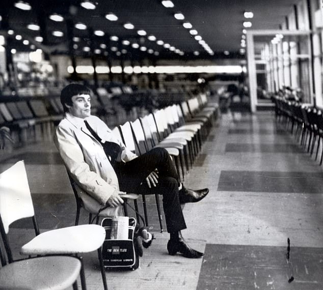 Jimmie Nicol is seen here waiting for a flight home to the UK, at Melbourne's Essandon airport in Australia  in June 1964 after his brief role as The Beatles' drummer ended
