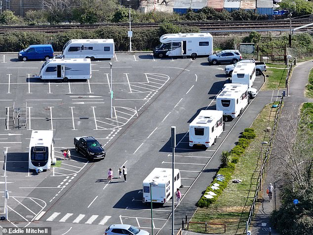 At least 19 caravans are parked up at the Tesco superstore in Wick, Littlehampton