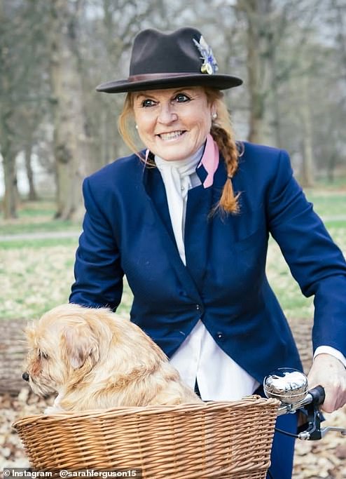 In another one, Sarah is seen on a bicycle with an adorable ginger terrier perched in the basket