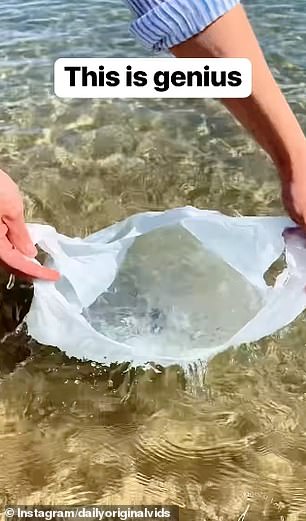 First, she heads to the sea and fills the bag up with water