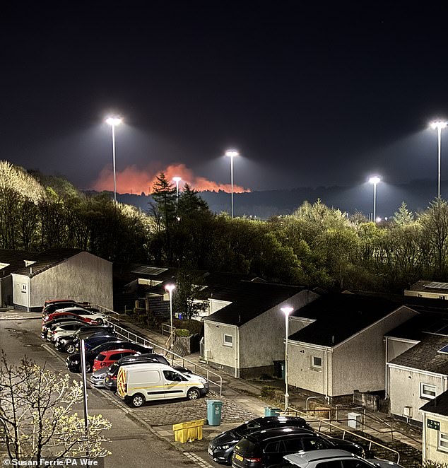Closing in: Residents in Cumbernauld could see the fire on the hills in the distance