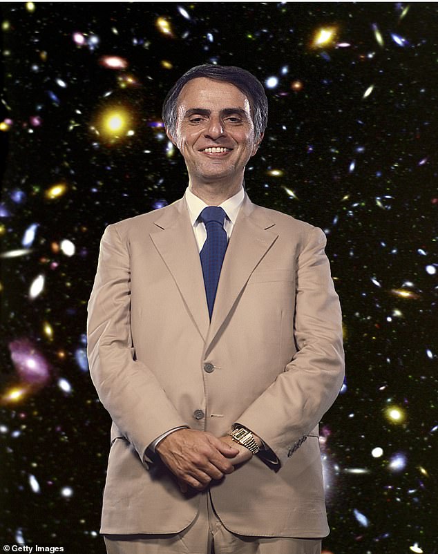 She famously sung about falling in love with an extraterrestrial in 2010 hit track E.T. and now she is turning to the work of one of the most famous astrophysicists who studied them in the aforementioned Sagan (pictured in 1984)
