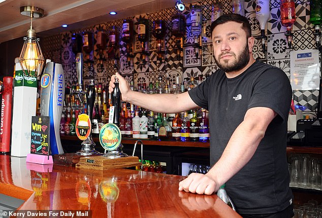 Pub Landlord Erhan Sahin, 36, is pictured at The Three Steps Pub in Cowley High Street