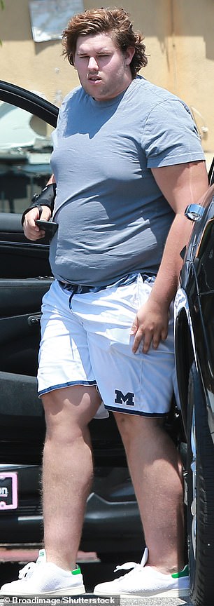 His latest look is the result of a quiet fitness journey he began back in 2020; (seen in 2018)