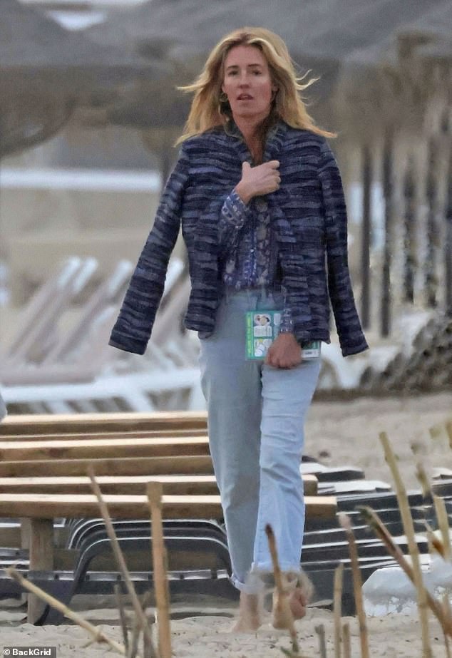 Cat Deeley wrapped up warm as she visited a beach in Marbella with her parents, Janet and Howard Deeley, on Thursday during their family getaway to Spain