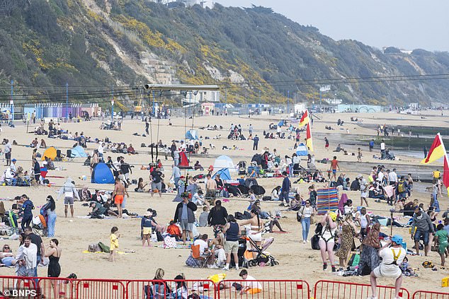 Crowds were seen flocking to the golden sands of Bournemouth beach in Dorset today