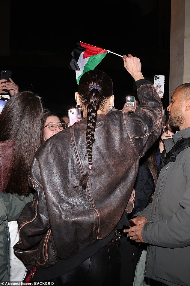She waved the flag high in support of the country