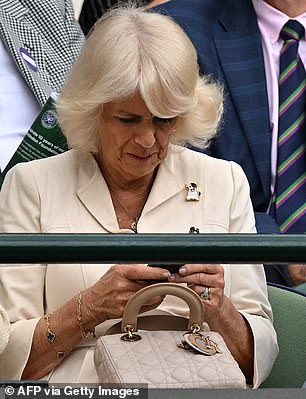 Camilla carried the same handbag at Wimbledon in     the July