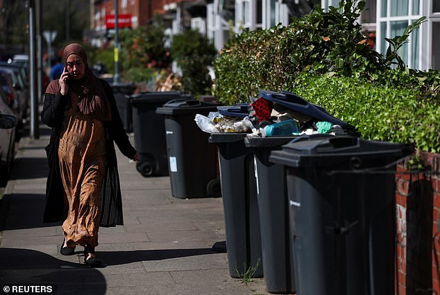 Bins overflowing on the streets of Birmingham following six weeks of strikes