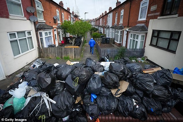 It comes after Raymer failed to stand up to striking barons in Birmingham. Pictured: Uncollected household waste and rubbish blights Primrose Avenue, in Sparkbrook, as Birmingham council refuse collectors continue their strike on April 15, 2025 in Birmingham, England