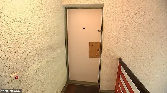 This image shows the entrance to the apartment of one of the doctor's suspected victims