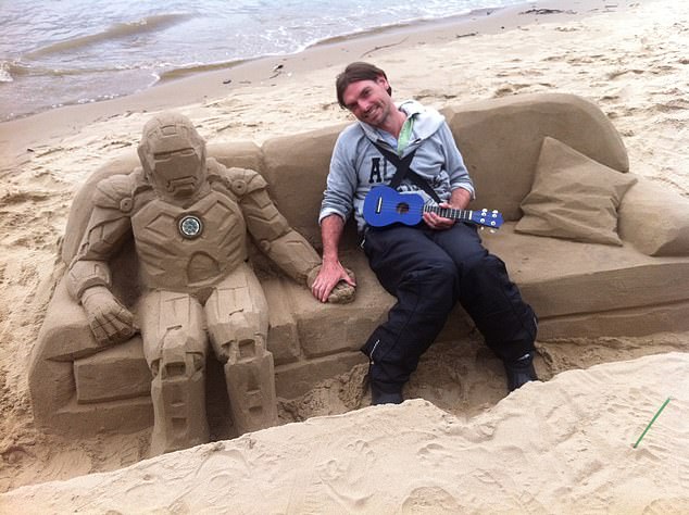 Andrew describes himself as an ¿artist and busker¿ and runs an organisation called Dirtybeach, which creates sand sculptures on beaches to make political and environmental points