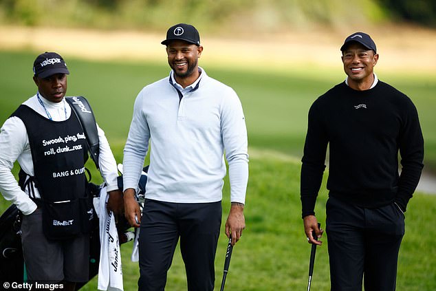MLB player Aaron Hocks (center) shares a laugh with Tiger Woods (R) at 2024 Genesis Open