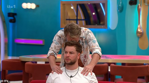 After the announcement was made to the group, several housemates were visibly shocked to hear Daley's name come up (Chris Hughes and Chesney Hawkes)