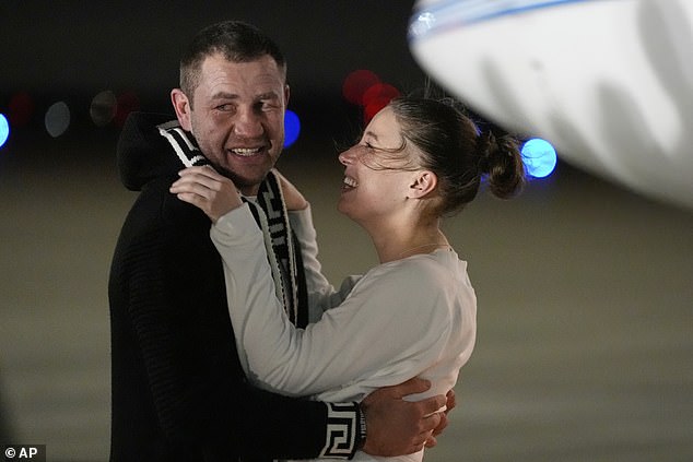 Karelina was overjoyed as she finally was held by her fiancé as she arrived on Thursday April 10 in Maryland