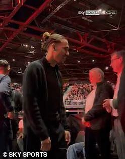 Liverpool defender Kostas Tsimikas attended the fight just hours after playing v Leicester