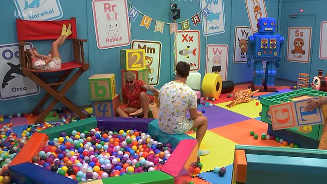 Danny Beard falls into a pile of boxes on Celebrity Big Brother