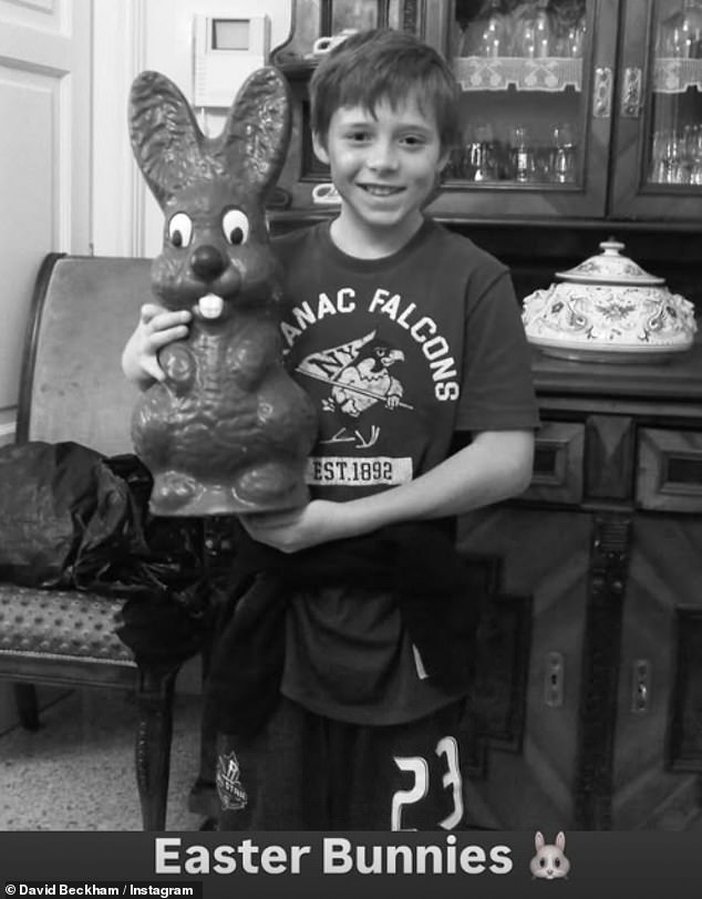 David also uploaded throwback snaps of children Brooklyn, 26, (pictured) Romeo, 22, Cruz, 20, and Harper, 13, on Easter