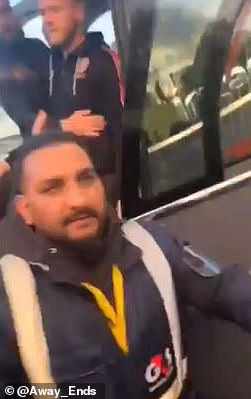 A security guard had to intervene and hold the supporters back after the incident