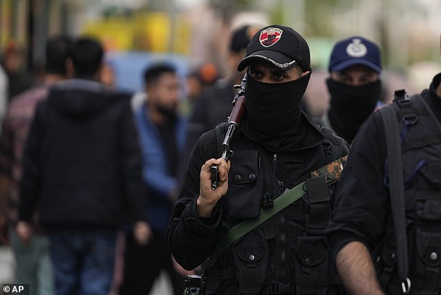 Jammu and Kashmir Special Operation Group (SOG) personnel patrol at a busy market in Srinagar, Indian controlled Kashmir,Tuesday, April. 22, 2025