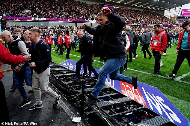 Thousands of fans of the Lancashire club ran onto the field after the final whistle of a 2-1 victory over the Blades