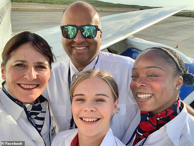 British Airways flight attendant Irfan Ali Mirza, 45, (back row, second from left) was found dead in his hotel room during an American stopover. Pictured on a trip last August