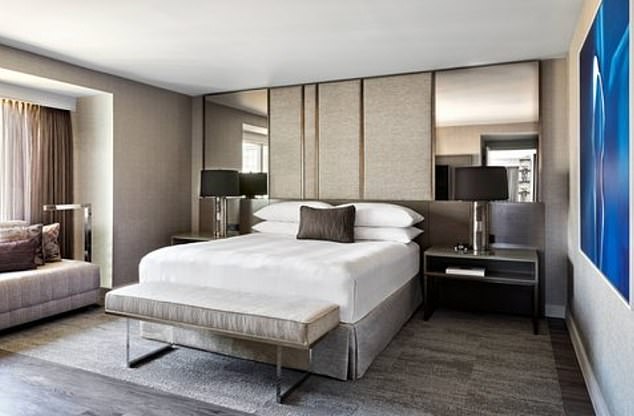 After failing to raise him on the phone, hotel managers unlocked the room, where they found Mirza, from London, dead in his bed (stock photo of a room from the hotel)