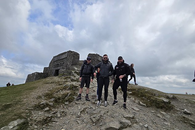 Last April, Mike - who used to be 'an outgoing, independent man who loved the outdoors' - was able to go hiking with friends but is now a 'prisoner' in his body