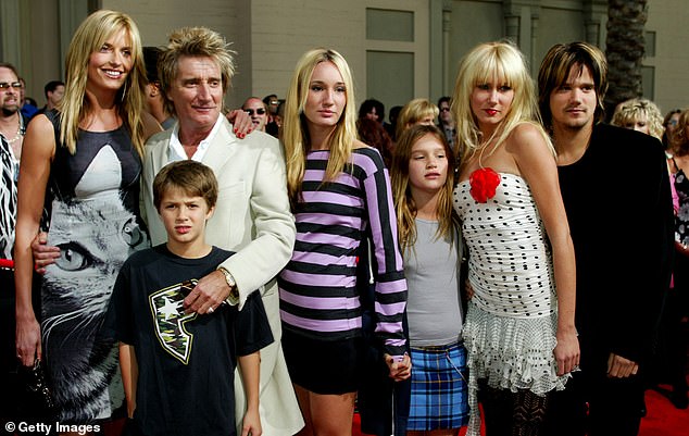 Discussing the subject of blended families on the latest Loose Women podcast, Penny reflected on entering Rod's life when his children Liam and Renee were young [Liam second left and Renee third right in 2003]