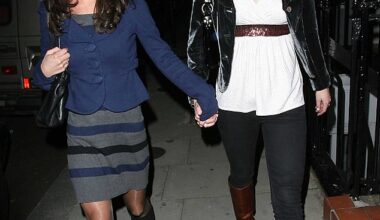 And when I asked Kate where she had got her lovely white top ¿ which she had paired with a pair of elegant black jeans and brown knee-high boots ¿ she flashed her beaming smile (pictured with Pippa that night)