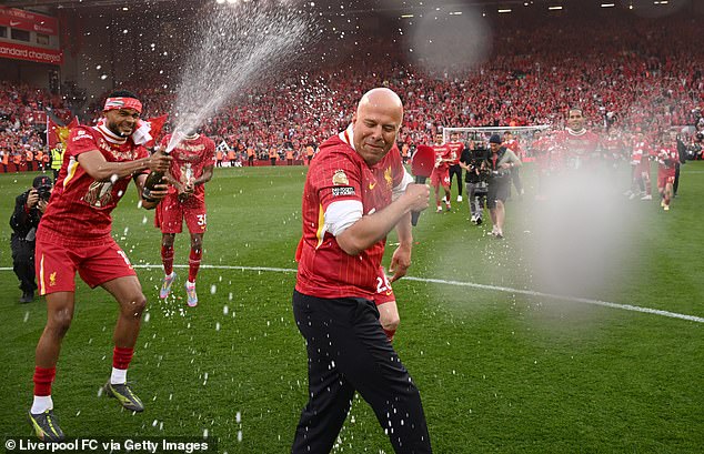 Arne Slot was drenched in champagne by Cody Gakpo after addressing the crowd